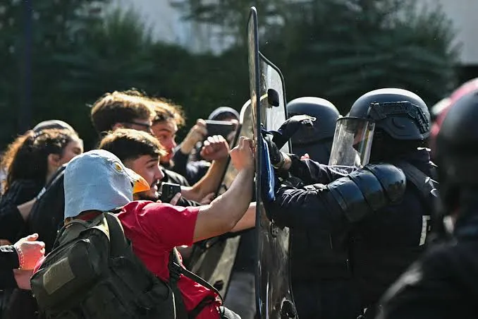 Anti-riot police officers face protesting students carrying out blockading action outside the secondary school Le Corbusier, in Aubervilliers, northern Paris on October 1, 2026.Lou Benoist—AFP/Getty Images